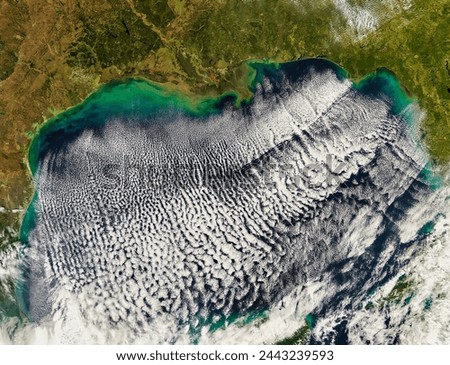 Wind Churns the Gulf of Mexico. Strong winds gusted over the Gulf of Mexico on December 16, 2007, and though the wind is invisible in these. Elements of this image furnished by NASA.