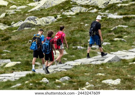 Tourists enjoy walking along the crest of the high mountain Chopok in the Low Tatras in Slovakia