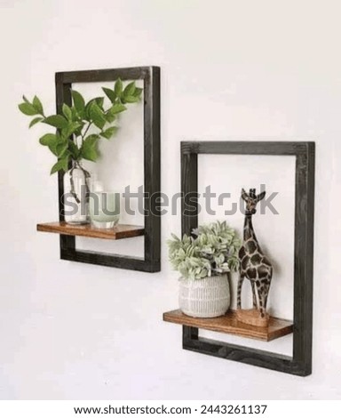 Wall shelf is decorated with beautiful vase and show peace.