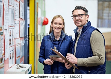 Warehouse, clipboard and portrait of business people with smile for collaboration, compliance and inspection. Billboard, woman and man with checklist for report, teamwork and factory information