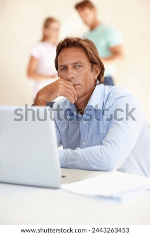 Mature man, thinking and portrait with laptop in office for internet, research online and website for company. Business person or editor and serious for planning with tech for email and vision