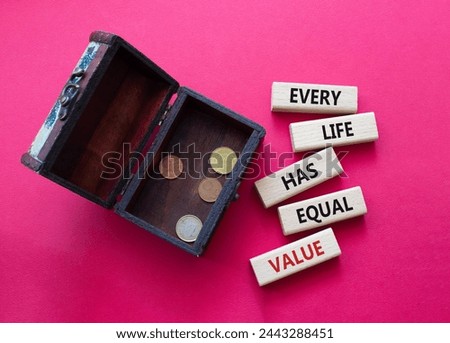 Equality symbol. Wooden blocks with words Every Life has Equal Value. Beautiful red background with money box. Equality and life concept. Copy space.