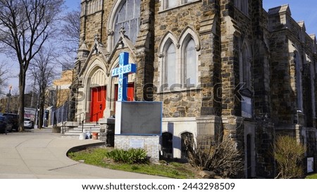 Church with a "Jesus saves"sign in front