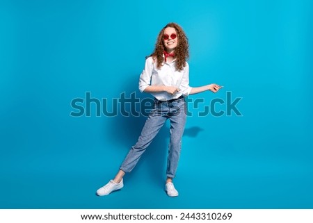 Photo portrait of nice young lady dancing disco sunglass summer vacation wear trendy white garment isolated on blue color background