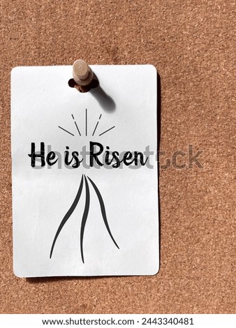 Lent, Holy Week and Easter Concept - he is risen text on white paper background. Stock photo.