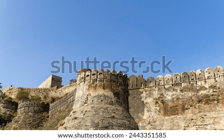ancient fort exterior wall ruins with bright blue sky at morning image is taken at Kumbhal fort kumbhalgarh rajasthan india.