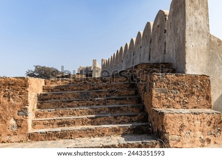 ancient fort wall ruins with bright sky from different perspective at morning image is taken at Kumbhal fort kumbhalgarh rajasthan india.
