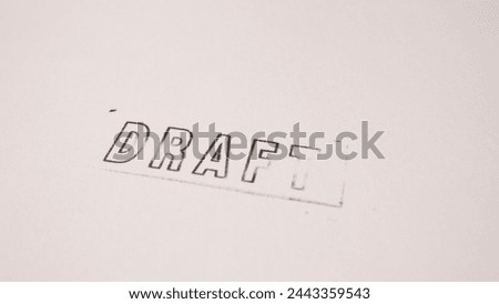 2 photo of black outline draft stamp inscription on white paper