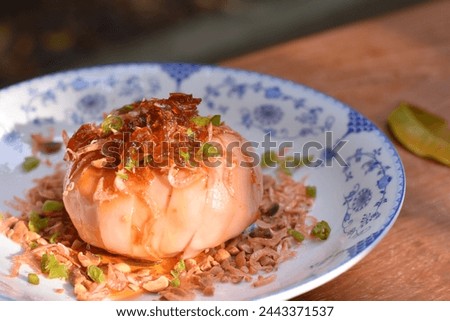 Thai dessert - Santol (Krathon) on top with chili, shrimp, peanut and a little bit of Thai sweet sauce - can put text on side of picture