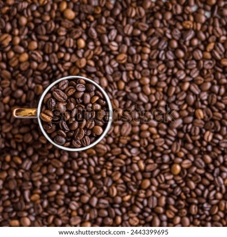 Coffee cup picture coffee Beans picture. Coffee beans background image. This is a coffee Beans image. This is looking good image for use in your different projects. 