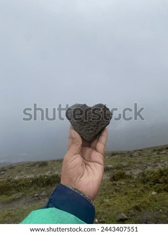 This picture is represent symbol of love. As we can see in this picture the stone is shaped in a heart shape. if we walk around nature we can found many things like this which we didn’t even expect.