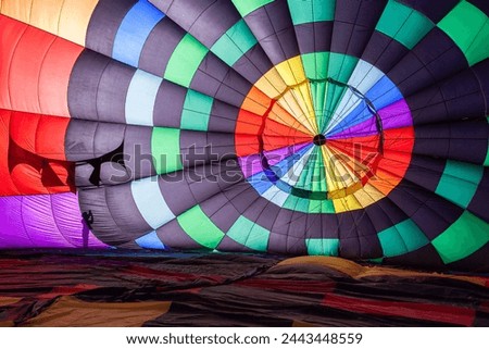 Hot air balloon inside and the shadow of a man