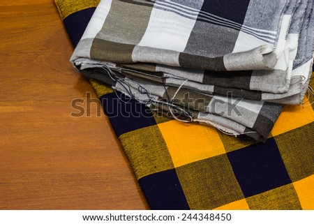 thai fabric on wooden floor