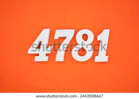 Orange felt is the background. The numbers 4781 are made from white painted wood.