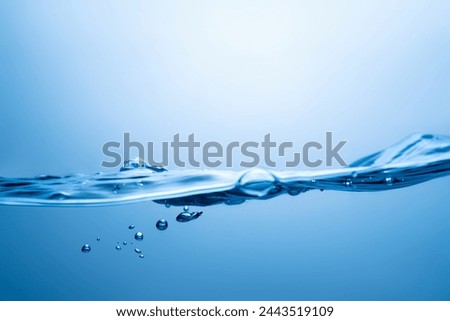 Water surface and wave on blue background