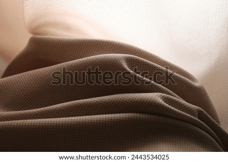 nice shade of fabric color, beige - light brown, with a cream or grayish tint, gives a wonderful background and shadow shape