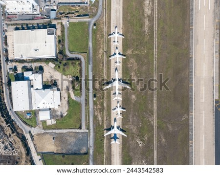 Aerial view of an airport. aerial view of airport terminal with parked airplanes