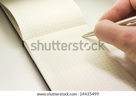 hand writing in a notebook