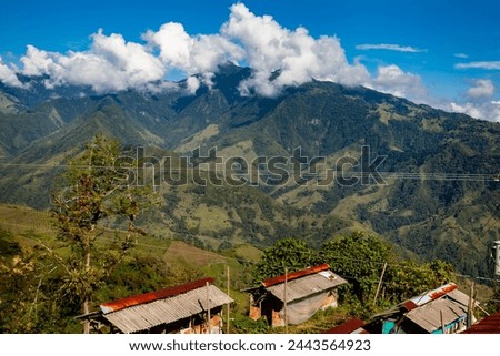 The amazing landscapes of the Central Ranges on the ascent to the High of Letters between the cities of Fresno and Manizales in Colombia Royalty-Free Stock Photo #2443564923