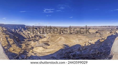 Panoramic picture of the Fish River Canyon in Namibia taken from the upper edge of the south side in summer