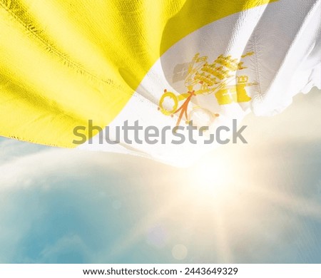 Vatican City waving flag in beautiful sunlight.