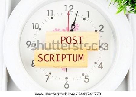 POST SCRIPTUM ancient Latin saying meaning - afterthought, afterwards text on the wooden blocks on the clock with hands