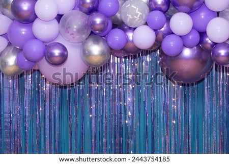 Photo corner decorated with balloons.