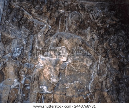 Ardhanarishvara sculpture in Elephanta Caves : Elephanta Island, Maharashtra, India Royalty-Free Stock Photo #2443768931