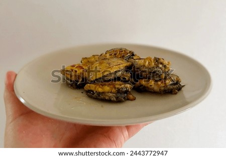 Grilled abalone(ear shell) with butter and salt. Korean food Royalty-Free Stock Photo #2443772947