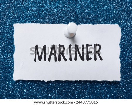 Mariner writting on blue background.