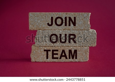 Join our team symbol. Brick blocks with words Join our team. Beautiful red background. Business and Join our team concept. Copy space.