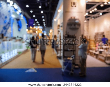 Abstract blur people in home and gardening market fair event background. Exhibition tradeshow business concept. Defocus Interia decoration in Home and Garden Exhibition 2024 Show in Bangkok, Thailand