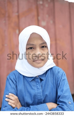 Portrait of Asian girl wearing hijab