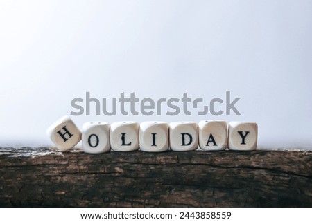 Pictures of characters in English on old wooden with concept holiday time.