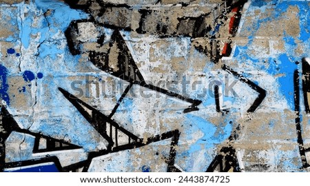 Colorful background of graffiti painting artwork with bright aerosol outlines on wall. Old school street art piece made with aerosol spray paint cans. Contemporary youth culture backdrop Royalty-Free Stock Photo #2443874725