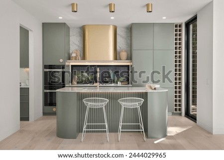 Modern kitchen with beautiful interior designed. Bathed in natural light and a symmetrical image. SHOTLISTlife
