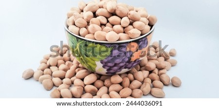 Peanuts are one of the ingredients for making peanut cookies Royalty-Free Stock Photo #2444036091