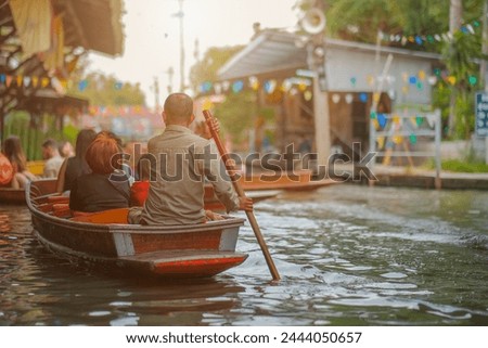 Damnoen Saduak Floating Market, tourists visiting by boat, located in Bangkok, Amphawa Floating market, Amphawa, Tourists visiting by boat, Thailand Royalty-Free Stock Photo #2444050657