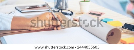 Banner Businesswoman hands note meeting document in conference room. Woman Hands writing planning on notebook. Female hand holding pencil write on diary sketchbook. Business Planning with copy space