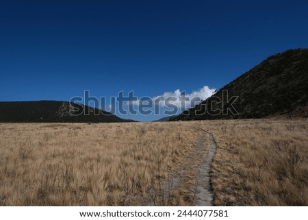 wild landscape picture of mountain, blue sky