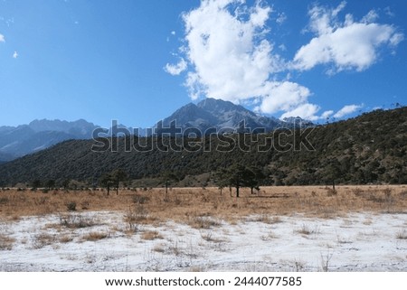 wild landscape picture of mountain, blue sky