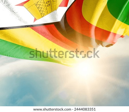 Zimbabwe waving flag in beautiful sunlight.