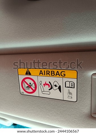 Noticeboard of AIRBAG in car.AIRBAG signboard in motor car.