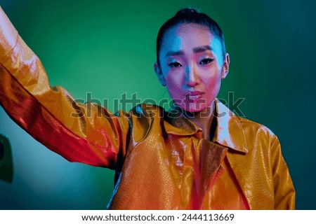 Trendy woman beauty neon disco model yellow fashion light colorful green