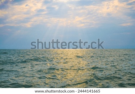 Picture of a natural outdoor sunset over the sea