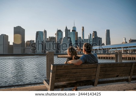 Couple Enjoying Manhattan Skyline View from Brooklyn