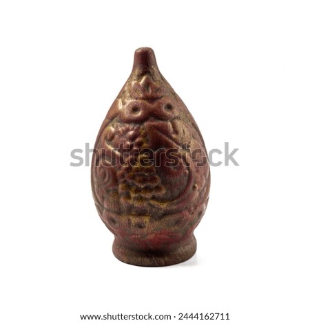Souvenir Qvevri (Kvevri) made of clay for drinking wine. Bas-reliefs in the form of a grapevine. Kvevri are earthenware vessels used for 
the fermentation, storage and ageing of Georgian wine. Royalty-Free Stock Photo #2444162711