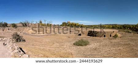 Great Kiva at Aztec Ruins National Monument in New Mexico. Best preserved Chacoan structures including Aztec West great house built by ancestral Pueblo people. Reconstructed kiva, religious site. Royalty-Free Stock Photo #2444193629