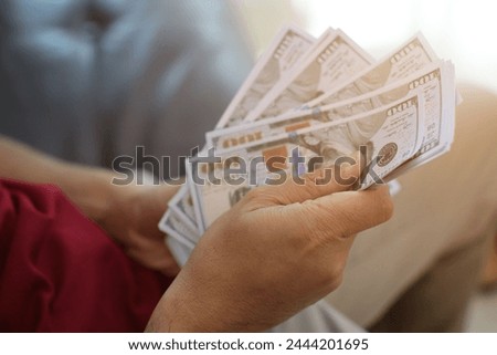 Money dollar bill in hand