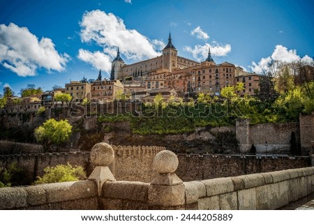 View of Toledo, Castila la Mancha, Spain, world heritage city with the Alcazar high above on a bright day Royalty-Free Stock Photo #2444205889